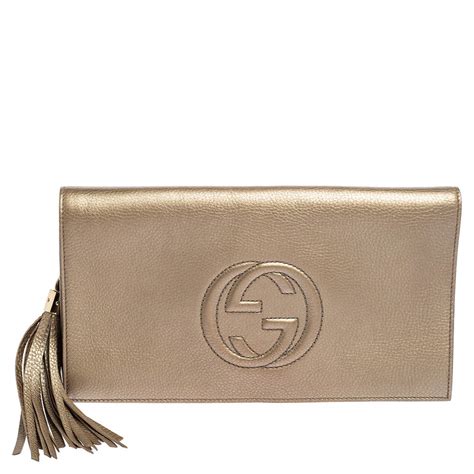 gucci soho clutch gold|Gucci snakeskin clutch.